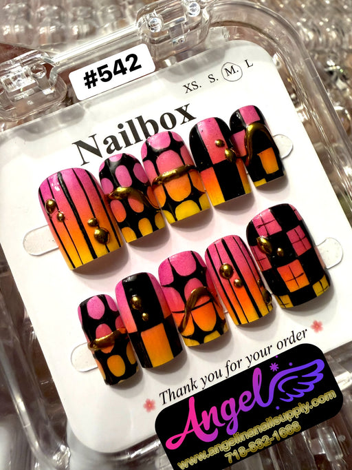 Set of colorful nail art designs in a clear packaging with 'Nailbox' branding.