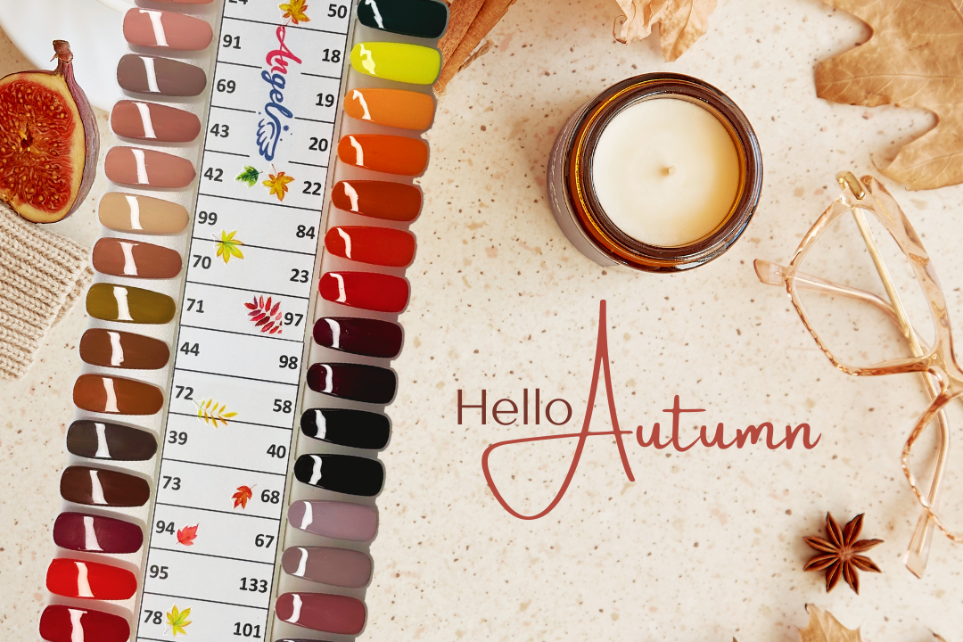 Color swatch with 'Hello Autumn' text, candle, and fall leaves on a textured surface